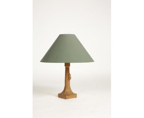 •ROBERT THOMPSON: AN OAK TABLE LAMP with tapering octagonal column on a square base with prominent mouse halfway up the colum