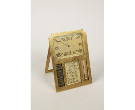 A FRENCH GILT METAL TRAVELLING CLOCK and perpetual calendar, the rectangular case with gilt clock face above perpetual calend