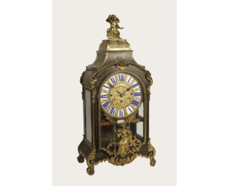 A LOUIS XIV STYLE BOULLE AND ORMOLU MOUNTED BRACKET CLOCK retailed by S. Wartenberg, Paris, the gilt dial with enamel Roman n