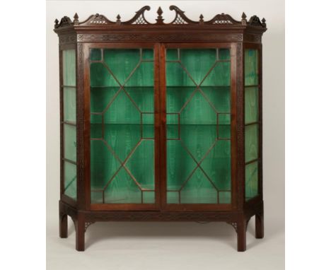 A LARGE EDWARDIAN "CHIPPENDALE REVIVAL" DISPLAY CABINET, the front with two large astragal glazed doors beneath a scrolling p