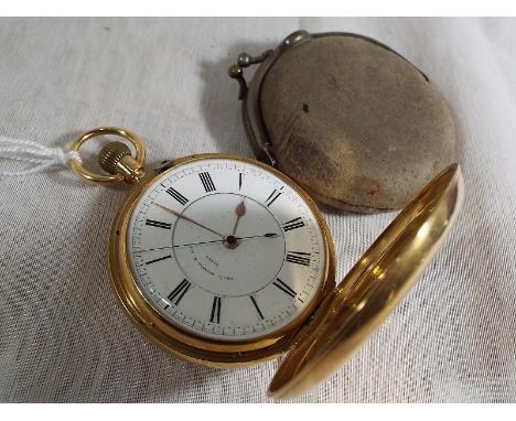 A gentleman's 18 carat gold cased hunter style pocket watch, the case opening to show the white enamel dial signed for Thomas