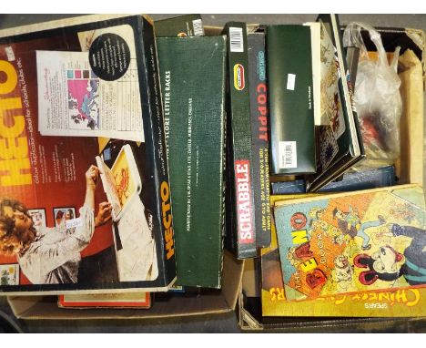 Two boxes of vintage boards games, chess set , books and similar (2)