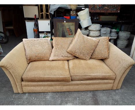 A good quality upholstered three seater sofa, 65cm(h) x 200cm (w) x 103cm (d) PLEASE NOTE THAT LOTS 601 TO 650 WILL BE AUCTIO