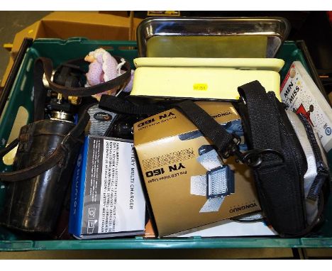 A collection of vintage cameras, binoculars and similar