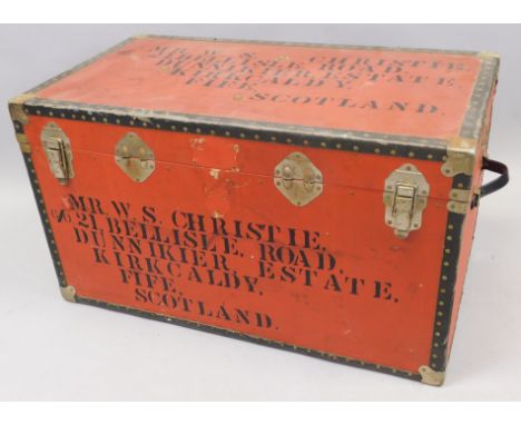 A canvas bound red and black painted trunk, with inscription, 91cm wide