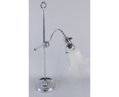 A mid 20thC chrome plated adjustable lamp base, with frosted glass shade, 57cm high