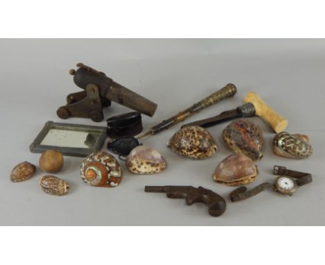 Miscellaneous collectables, to include a parasol handle, walking stick handle, a miniature mahogany and metal cannon, a pisto