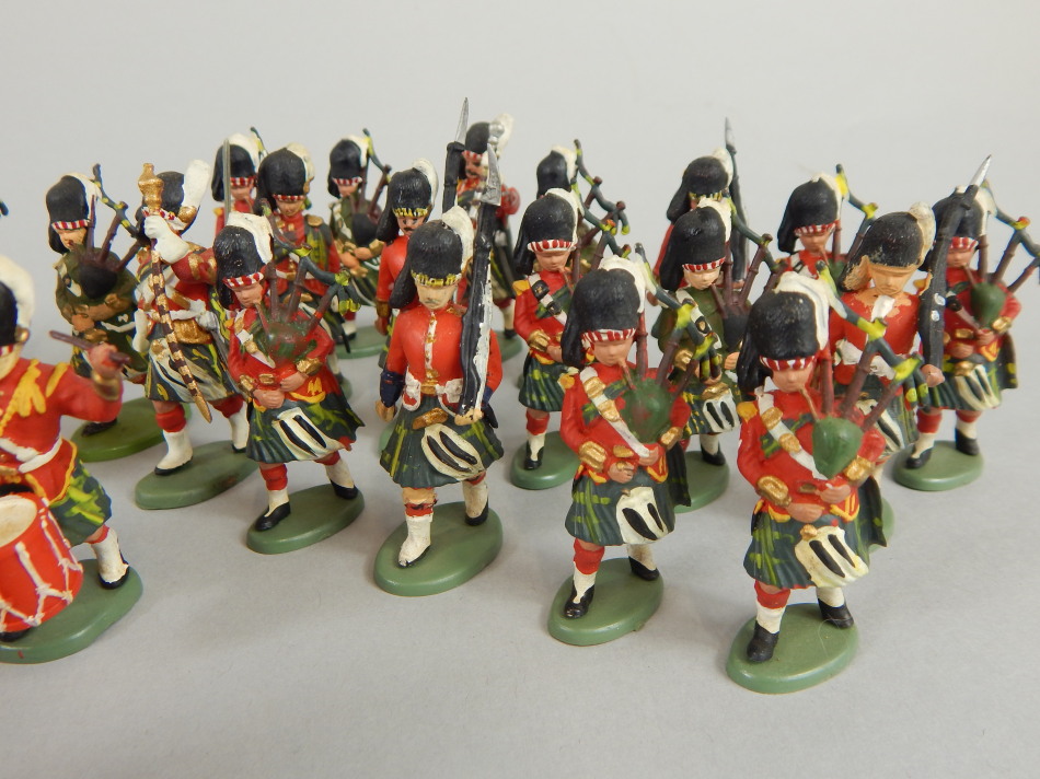 A Collection Of Britains Plastic Scots Guard Soldier Figures, Each On 