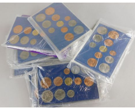 A quantity of 1971 British first issue of decimal coins sets, in perspex holders