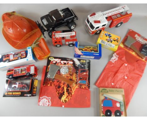 Various fire related children's toys, to include Corgi Fire Heroes, etc.