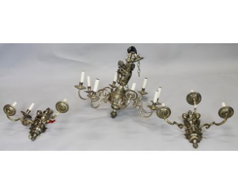 A Continental silvered metal eight branch chandelier, with three caryatid supports, scrolling arms and pineapple style finial