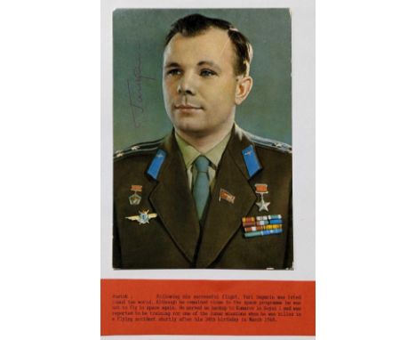 Cosmonauts - a polychromatic postcard of Yuri Gagarin, the first person to fly in space in April 1961, bears signature in red