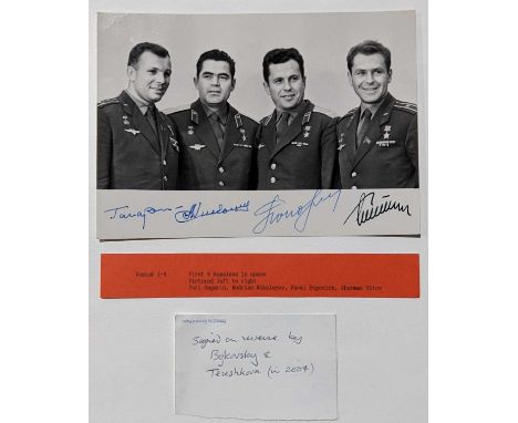 Cosmonauts - a black and white photograph of Yuri Gagarin, Andrian Nikolayev, Pavel Popovich and Gherman Titov, the first fou