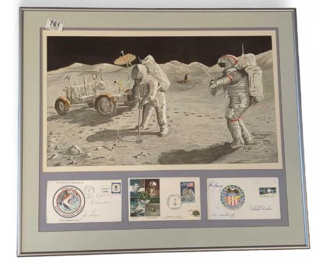 A framed and glazed display with a watercolour of a lunar mission scene, a 1989 Apollo 11 commemorative first day cover, and 