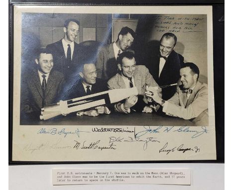 A black and white photograph of the Mercury 7, the first US astronauts - Alan B Shepherd, Walter M Schirra, John H Glenn, Don
