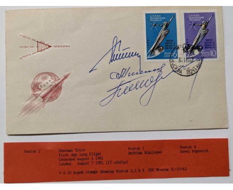 Cosmonauts - a Soviet era first day cover, bearing the signatures of Gherman Titov, Andrian Nikolayev and Pavel Popovich, all