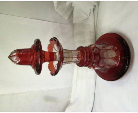 A large Bohemian overlaid ruby glass scent bottle with gilding, the base numbered '15', height 23cm