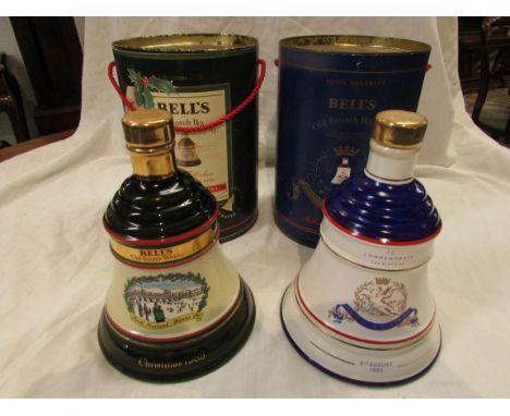 Two Bell's Scotch whisky Wade porcelain decanters, one for Christmas 1989, the other to commemorate the Birth of Princess Bea