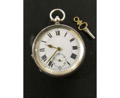 A continental silver cased pocket watch, the unsigned white enamel dial with Roman chapter and subsidiary seconds dial, gold 