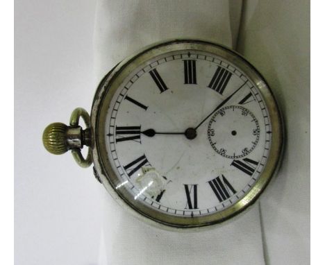 A continental silver pocket watch, unsigned white enamel dial with subsidiary seconds dial, outer back case engine turned and