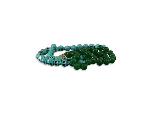 in the Thebetian taste, together with a modern jade bead necklace
