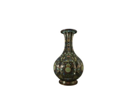 of baluster form the panelled vase with enamel shou and foliate design raised on a short foot, 34cm high