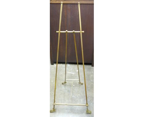 Edwardian style brass easel, square section frame and scroll decorated feet, height 159 cm 