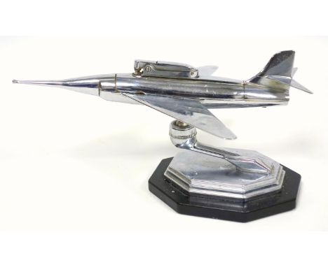 Gaia Sonic jet plane lighter in chromium plate on a Bakelite type base, 23.6 cm. 