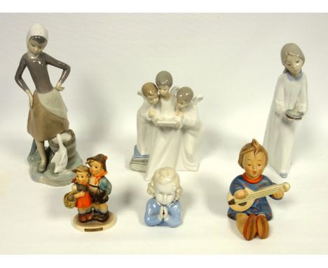 Lladro girl with goose, girl with chamberstick, Ilmenau girl praying, Nao three angels, and Goebel figures. tallest 24 cm, (6