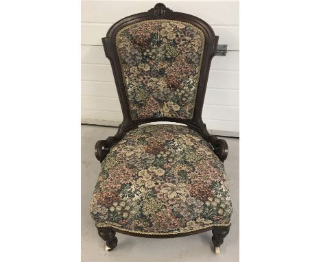  Floral upholstery to seat and button back. 
