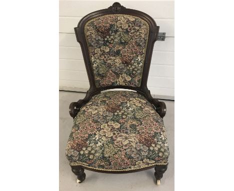  Floral upholstery to seat and button back. 