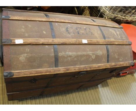 A WOOD &amp; METAL BOUND DOME TOPPED STEAMER TRUNK 