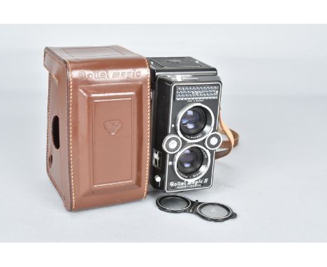 A Rollei Magic II TLR Camera, serial no. 2537108, shutter working on auto only, meter responsive, body VG, with Schneider-Kre