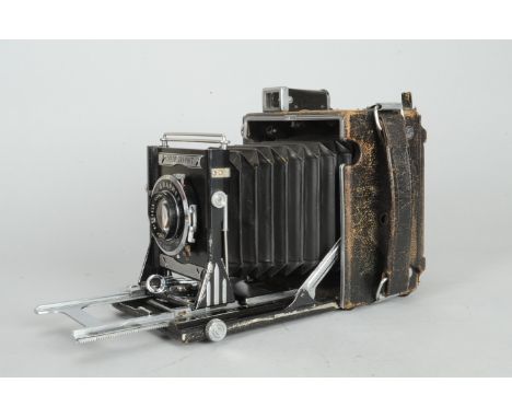 A Graflex Anniversary Speed Graphic 4 x 5in Press Camera, serial no. A60445, body F, back cover leatherette missing, viewing 