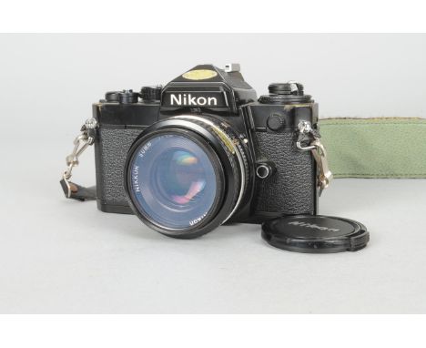 A Nikon FE SLR Camera, black, serial no. 3714551, body G, shutter working, meter reacts to light, a Nikon Nikkor 50mm f/1.8 A