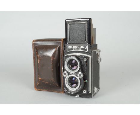 A M.P.P. Microcord TLR Camera, shutter sluggish on slow speeds, body G, some lifting to leatherette, button missing from cock