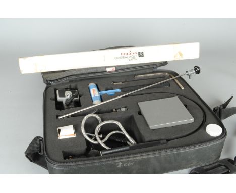 A Olympus Fiberscope, with Olympus SC16-C  camera, fiberscope control marked D-U, F-E, spare decabon tube, guide tools, malle