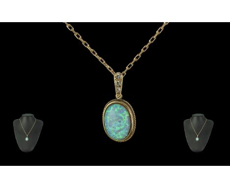 Ladies Attractive 9ct Gold Opal Set Pendant with Diamond Set Holder, with Attached 9ct Gold Chain. Both Chain and Pendant Mar