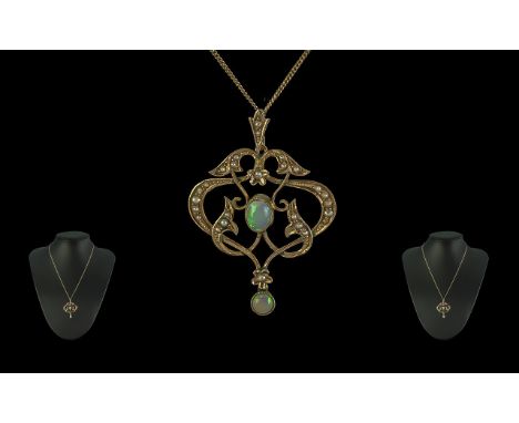 Edwardian Period 1902-1910 Attractive 9ct Gold Openworked Opal and Seed Pearl Set Pendant Drop, attached to a 9ct gold chain.