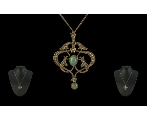 Edwardian Period 1902-1910 Attractive 9ct Gold Openworked Opal and Seed Pearl Set Pendant Drop, attached to a 9ct gold chain.