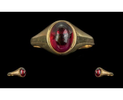 Ladies or Gents Attractive 9ct Gold Single Stone Ruby Set Ring.  Full hallmark to interior of shank.  The cabochon cut Ruby o