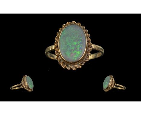 Ladies 9ct Gold Opal Ring. Hallmarked for 9ct Gold. Ring Size M. Approx Weight 3.4 grams. 