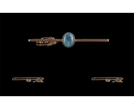 Antique Period Attractive 9ct Gold Opal Set Stick Brooch, Marked 9ct. The Central Opal of Good Colour, Est 2,5 cts. Weight 3.