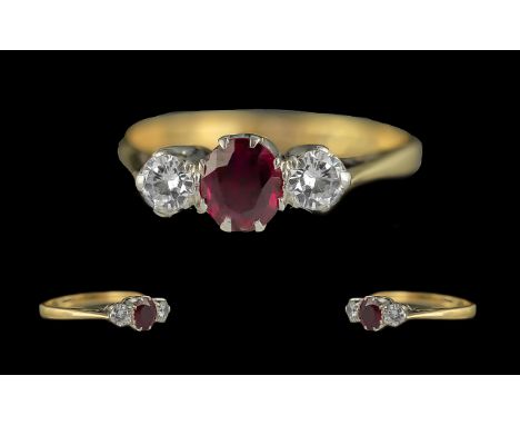 Ladies - Attractive 18ct Gold and Platinum 3 Stone Diamond and Ruby Set Ring. Marked 18ct to Interior of Shank. The Central R