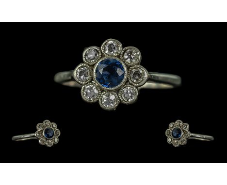 Art Nouveau - Petite 18ct White Gold Sapphire and Diamond Set Ring. c.1900. The Central Blue Sapphire of Pleasing Colour, Sur