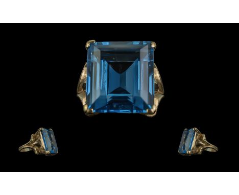 9ct Gold - Pleasing Single Stone Blue Topaz Set Statement Ring. The Large Blue Faceted Topaz of Good Colour. Est Weight 10,00