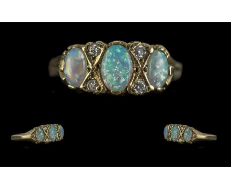 Antique Period Ladies 9ct Gold Opal &amp; Diamond Set Ring.  Full hallmark to shank.  The three oval shaped opals of good col