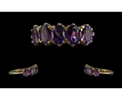 Ladies 9ct Gold Pleasing 5 Stone Amethyst Set Ring, full hallmark to interior of shank.  The five well matched Opal of gold c