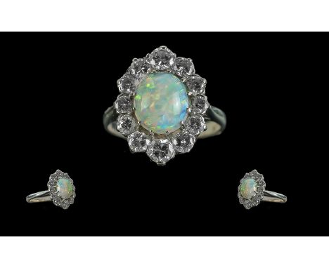 Ladies 18ct White Gold Attractive Opal &amp; Diamond Set Cluster Ring, hallmark to interior of shank.  The central Opal of ex