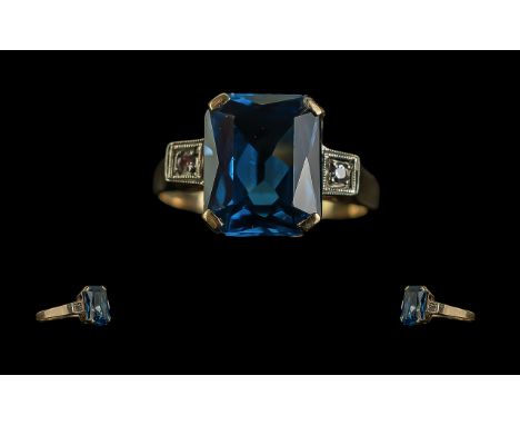 Ladies 14ct Gold Pleasing Blue Topaz and Diamond Set Ring. Marked 14ct to Shank. The Faceted Topaz of Good Colour. Est Weight